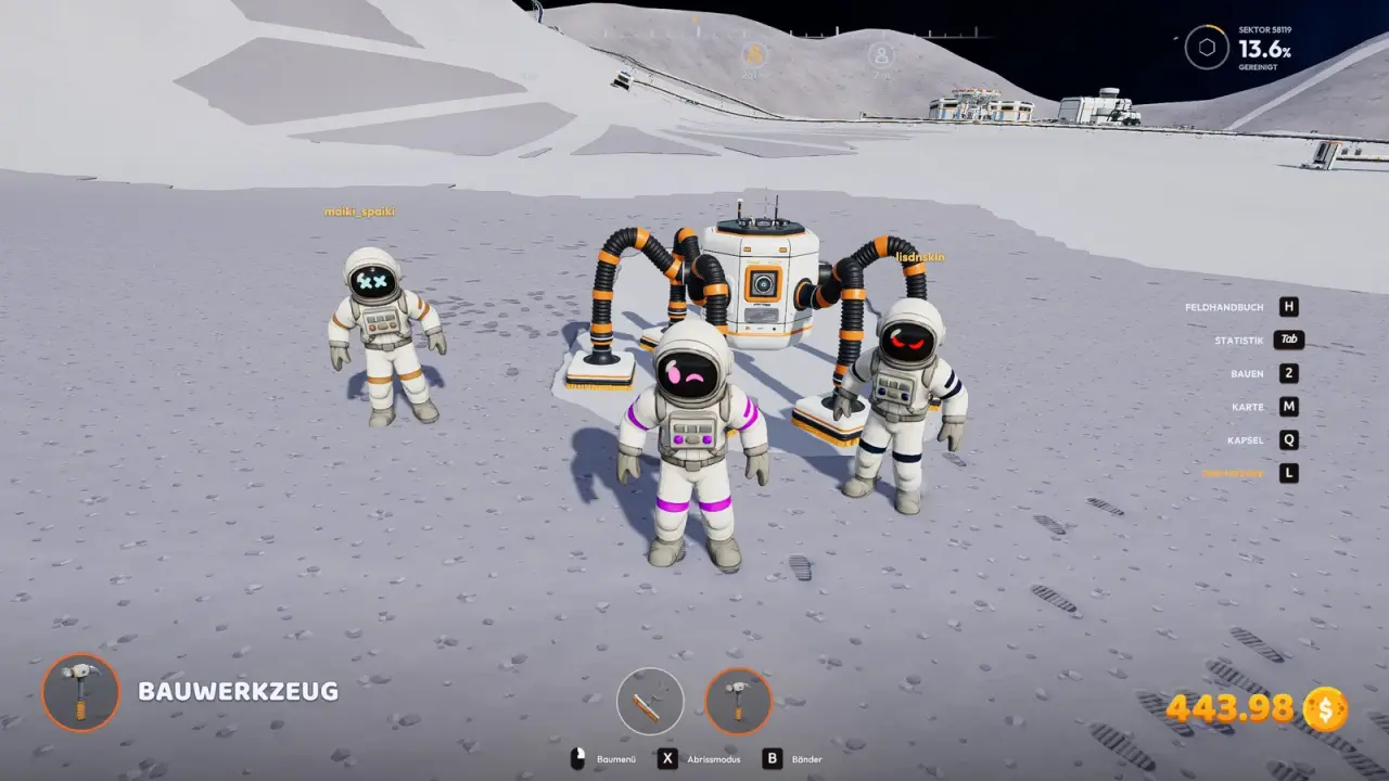 A J.O.O.N.A.S robot with orange jointed arms on the lunar surface, surrounded by three astronauts